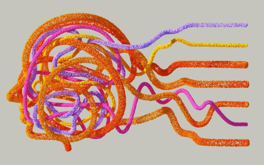 Strings of colorful pipe cleaners make up the profile of a head.