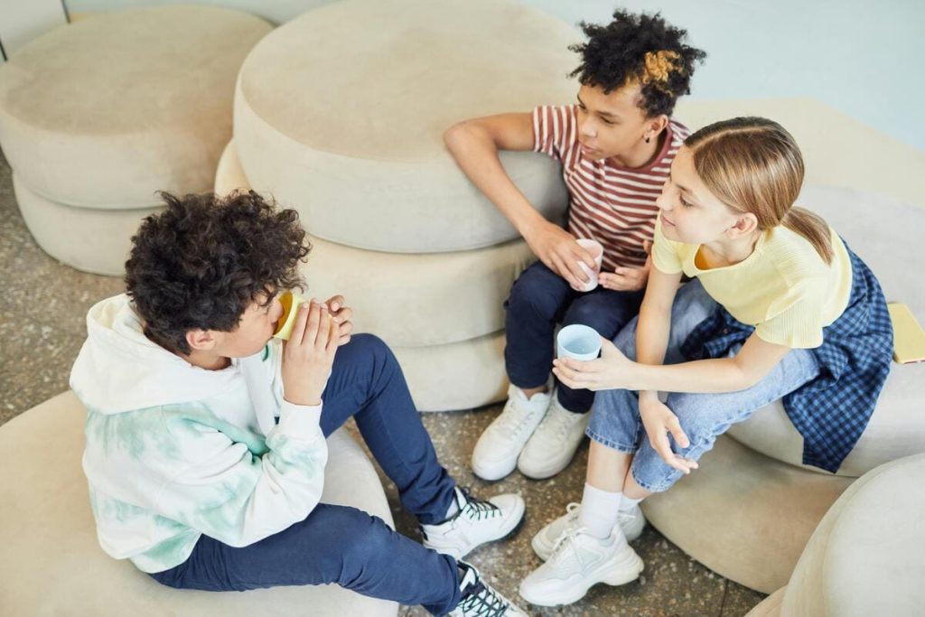 Three children chatting 